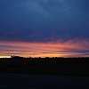 Sunset near Haast in the South Island, New Zealand. Couldn't sleep, in the morning was told a woman was murdered here 40 years before and her body left under the bridge across the road. Not recommended in Elsewhere.