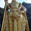 At Batu Caves, the Hindu temples up a couple of hundred steps into the side of a mountain outside Kuala Lumpur.