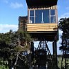 Tree house at Hapuku Lodge, Kaikoura, New Zealand. Luxury room with a view to the sea one way and the snow-dusted mountains the other. It doesn't get much better than this.