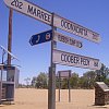 Signpost in the Outback, South Australia. Nearest traffic lights about five hours away.