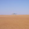 The runway at Innamincka in northern South Australia. The Innamincka Hotel has an outdoor bar called, of course, the Outer-Mincka. It was 37 degrees this day. And dry. Had been for a couple of years.