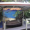 At the Mossman Gorge on the Daintree River in northern Queensland. These are the very attractive, if croc-exalting, women's toilets. The mens was less appealing