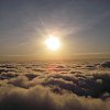 Dawn above the Atherton Tableland in Queensland, Australia. From a balloon drifting above the cloud cover.