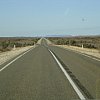 The road to Arkaroola from Hawker in the Australian Outback, this is the 16km long straight bit. There are winding bits as well -- and then it repeats itself, but it's dirt the rest of the way.