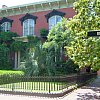 The famous/notorious Mercer-Williams house in Savannah, Georgia made internationally renown by John Berendt in Midnight in the Garden of Good and Evil. There is a chapter in Postcards From Elsewhere about Savannah and this place.