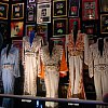 Elvis has left the building but his ghostly presence remains. Some of the King's stage clothes at Graceland in Memphis, Tennessee.