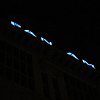 The airline may be long gone, but its name lives on in neon at the top of a building in Honolulu.