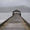 The famous pier at Hanalei on Kaua'i, one of the Hawaiian Islands. Tropical wind and rain on this day. Usually gorgeous. (Hmmm)