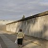 Walking by The Wall along Bernauer Strasse in old East Berlin. See Travel Stories pages.