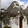 Trulli house with esoteric roof painting, Alberobello, Italy