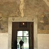 Faceless fresco and figure in Santa Maria Novella, Florence.